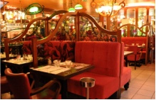 Joan of Arc - Le-Grand-Cafe-Reims with ‘Belle Epoch’ interior – all mirrors and gilt and red velvet seats.